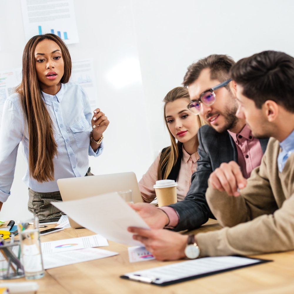 multicultural-group-of-marketing-managers-working-on-project-together-in-office